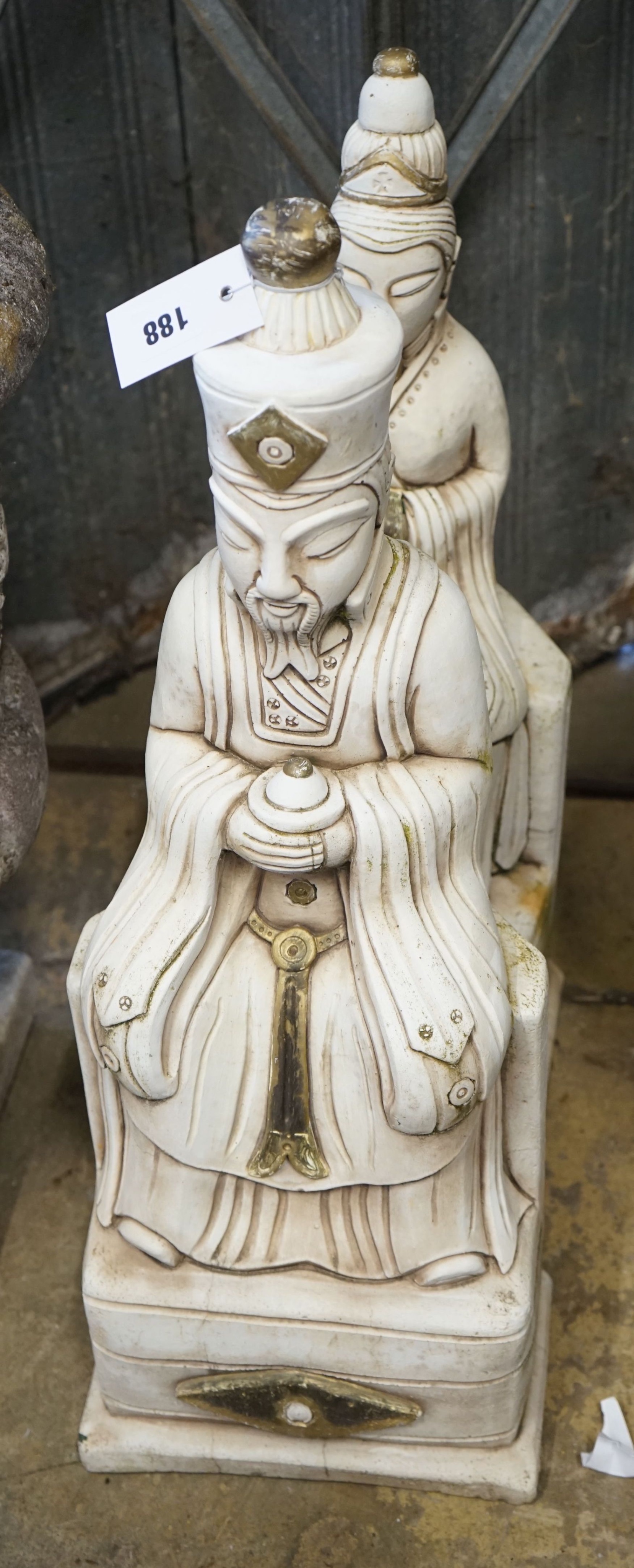 A pair of stone Buddha garden ornaments